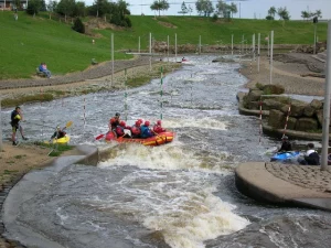 A picture of some people white water rafting at the Tees Barrage