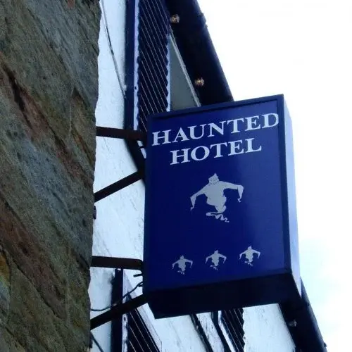 Haunted Schooner Hotel Sign